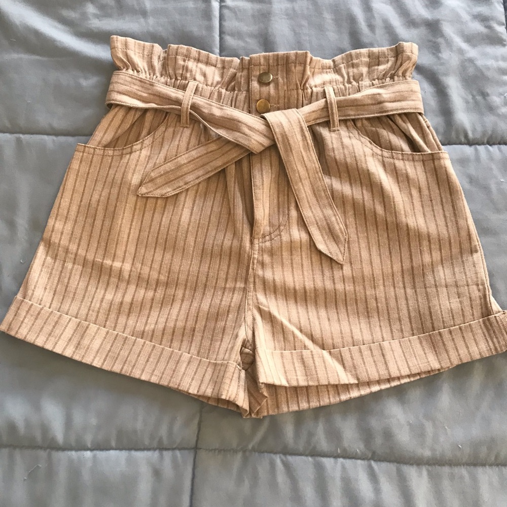 Trendy tan shorts with stretchy band & tie detail